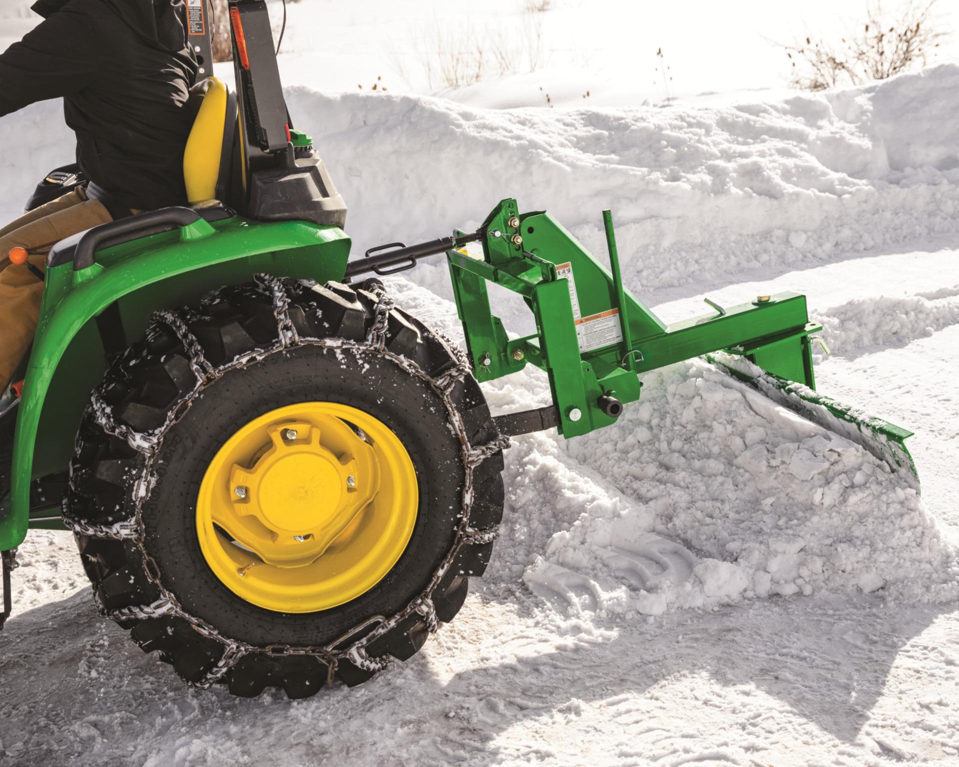 John Deere RB2072 Rear blade pushing snow.