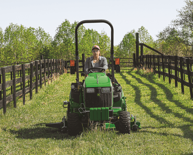 John Deere 1025R A John Deere 1025 mows a lawn in California.